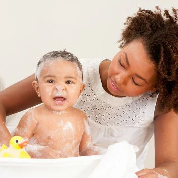 baby bath time with mum