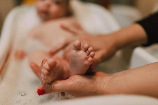 baby bath time with mum